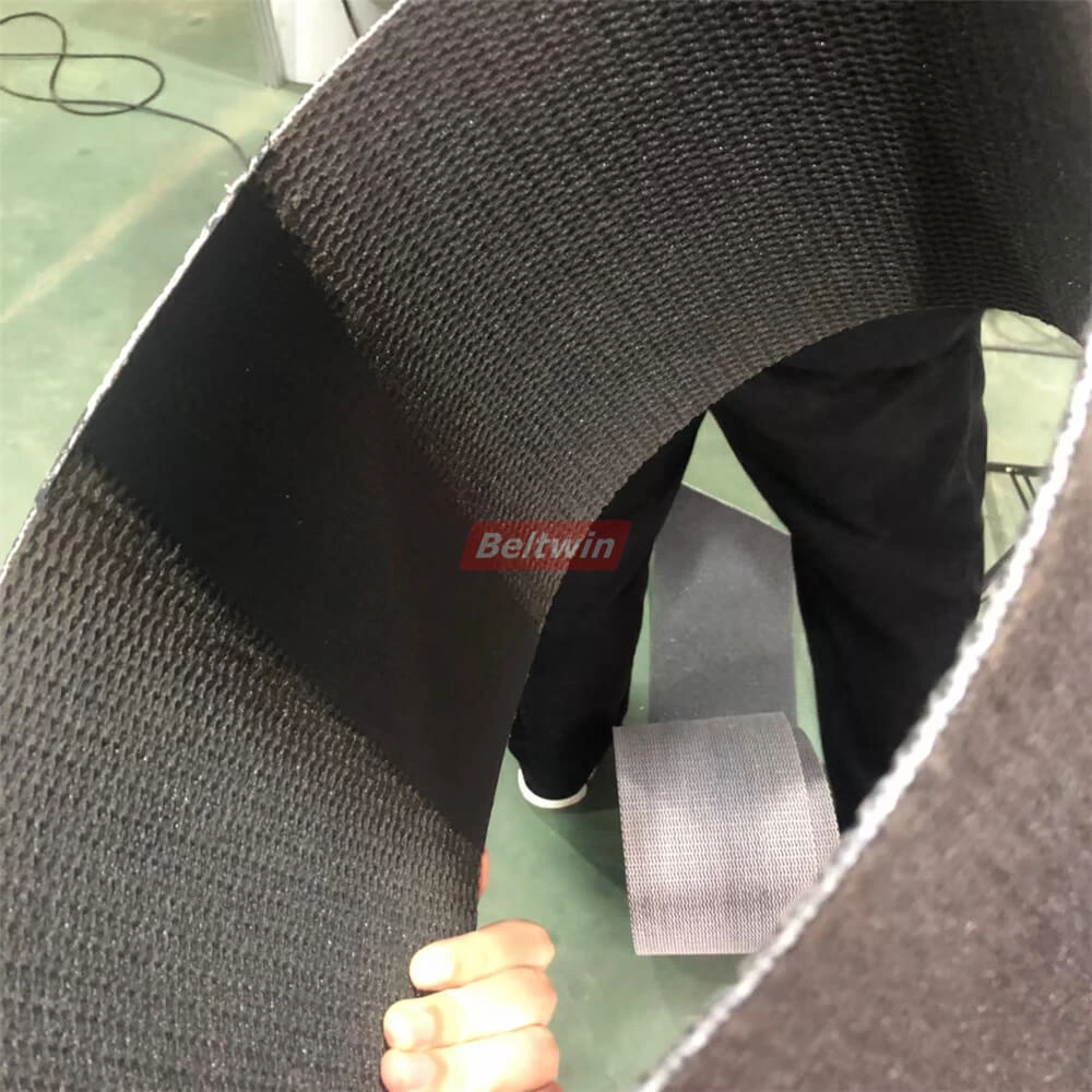 Comment épisser une courroie PVK par une presse à refroidissement par air et un poinçon automatique-1