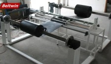 Découpeuse de bande transporteuse avec enrouleurs pour bande en caoutchouc