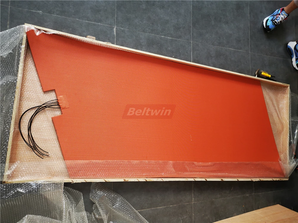 Élément chauffant en silicone pour vulcanisateur de bande transporteuse en caoutchouc