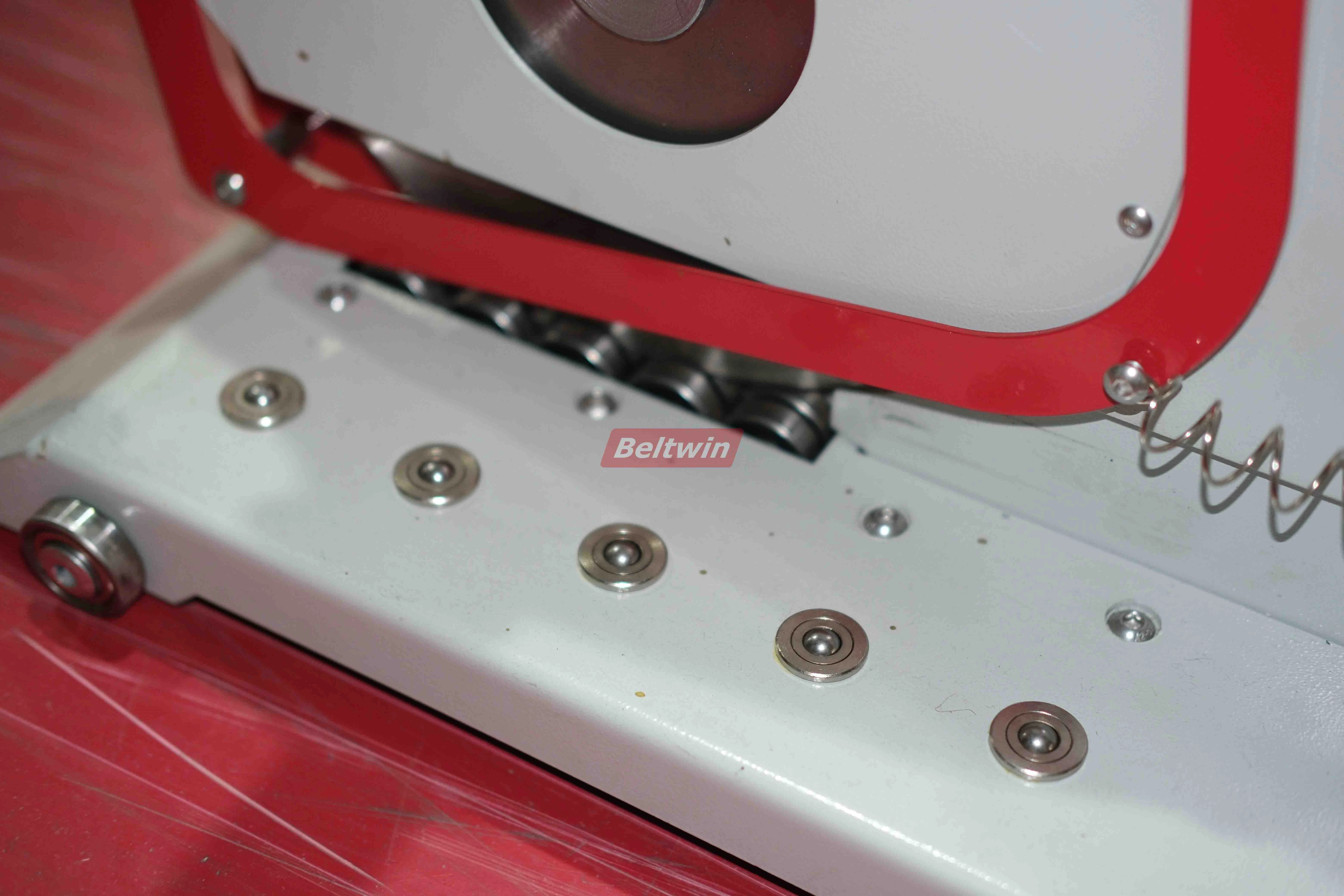 Coupeur portatif pour bande transporteuse en caoutchouc